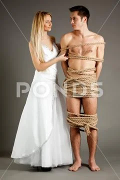 adam vindiola add Woman Tying Up A Man photo