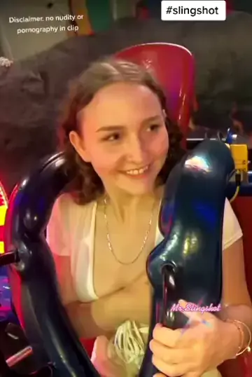 donnie simanjuntak add Tits Fall Out On Slingshot Ride photo