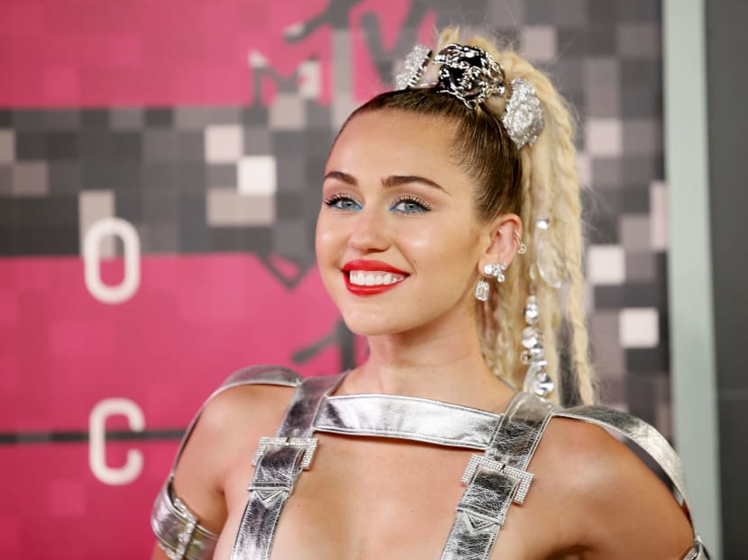 cora morales add Miley Cyrus Strap On photo